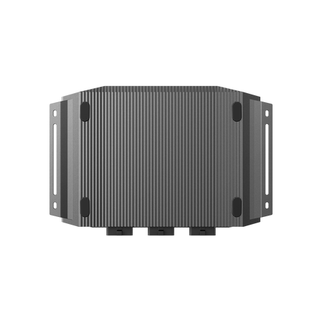 Rectangular ribbed metal power inverter or battery module on black background